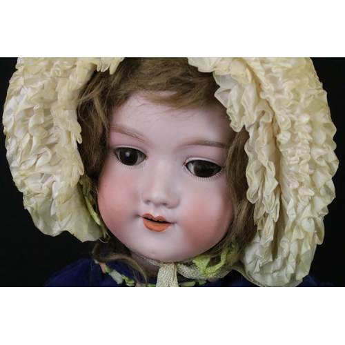 342 - Three early 20th C Armand Marseille bisque headed dolls with glass sleeping eyes, open mouths, paint... 