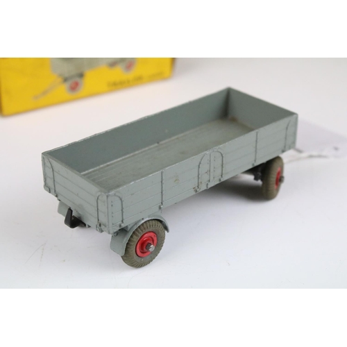 1371 - Four boxed Dinky 428 Trailer (large) diecast models all in grey with red hubs, showing play wear, bo... 