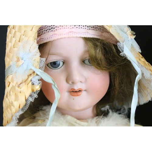 345 - Three early 20th C Armand Marseille bisque headed dolls with glass sleeping eyes, open mouths, paint... 