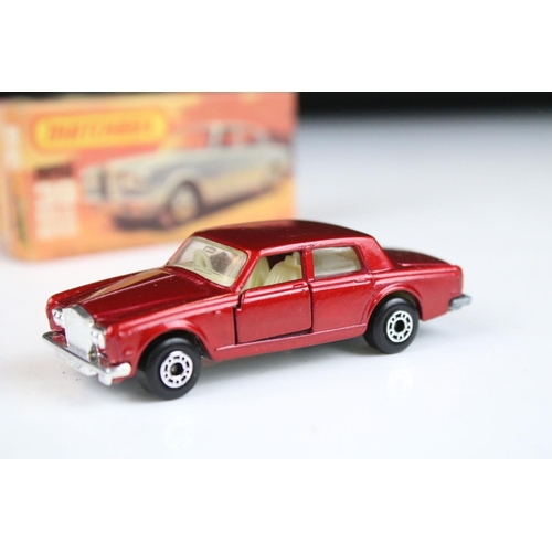 1374 - Five boxed Matchbox diecast models to include 18 Hondarora in red, 2 x 39 Rolls Royce (in metallic r... 