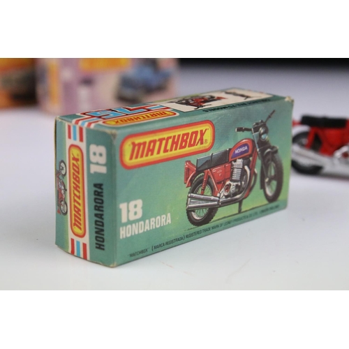 1374 - Five boxed Matchbox diecast models to include 18 Hondarora in red, 2 x 39 Rolls Royce (in metallic r... 