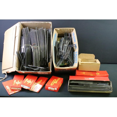 132 - Quantity of OO gauge and Hornby Dublo model railway track featuring curves and straights to include ... 