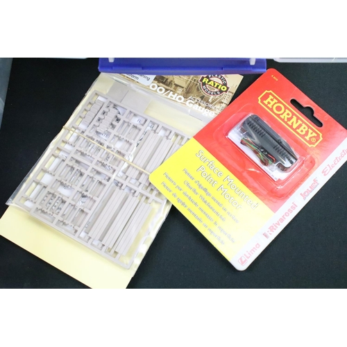 133 - Quantity of model railway accessories to include carded and bagged kits, poitentioneters, electrical... 