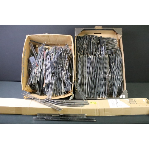 139 - Large quantity of various OO gauge track, some with signs of removal from previous lay out, straight... 