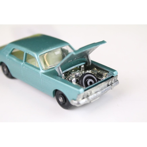 1381 - Two boxed Matchbox 75 Series 53 Ford Zodiac MK V diecast models in metallic light blue, one featurin... 