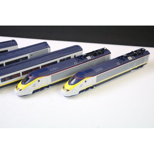 143 - Hornby Eurostar train pack containing locomotive, dummy and 4 x coaches (2 x coaches missing a set o... 