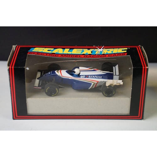 272 - Four boxed / cased Scalextric slot cars to include C143 Williams Renault FW 15C, C403 Ford Escort Co... 