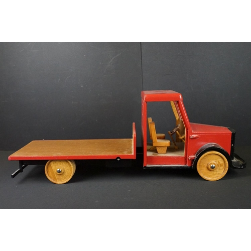 285 - Two scratch built painted wooden models to include flat bed truck with red cab and wooden slatted ef... 