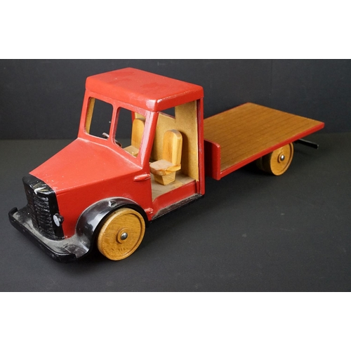 285 - Two scratch built painted wooden models to include flat bed truck with red cab and wooden slatted ef... 