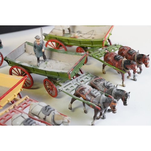 338 - Group of five mid 20th C painted metal Britains horses with carts / farm wagons, each with Britains ... 