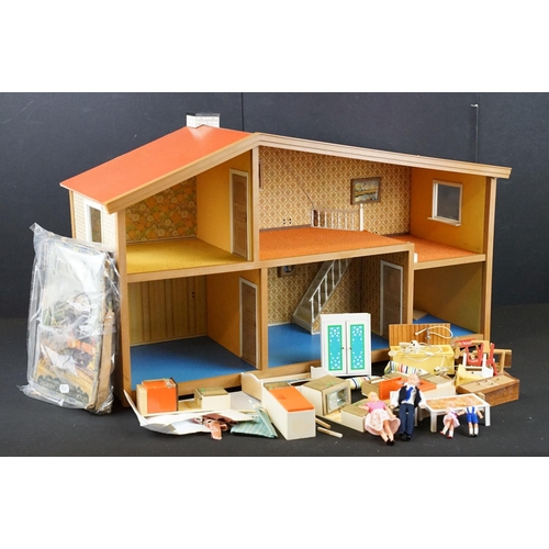 373 - Lundby Of Sweden dolls house, circa 1970s, together with a collection of related Lundby dolls house ... 