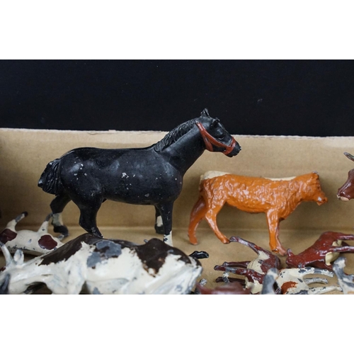 321 - Collection of around 80 various Mid 20th C Britains metal Farm animals to include mainly cows, calfs... 