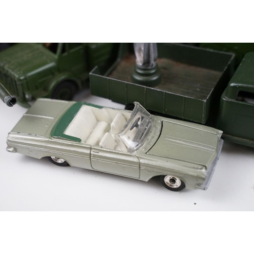 322 - Collection of 18 diecast models to include Dinky, Corgi and Britains examples featuring army related... 