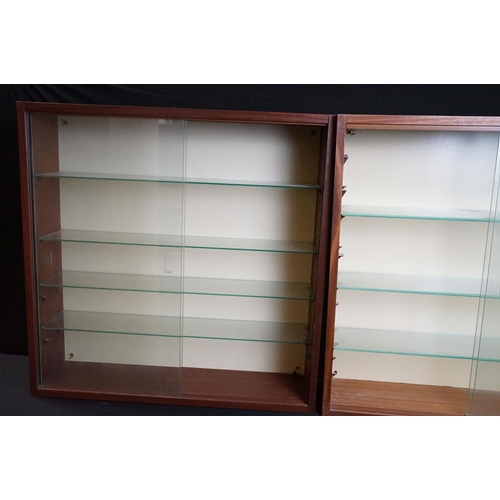 1257A - Collection of eight wall mounted wooden display cabinets with sliding glass fronts & glass shelves, ... 