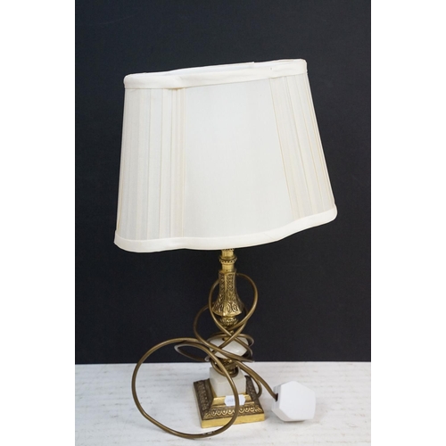 371 - A collection of three table lamps to include two brass examples.