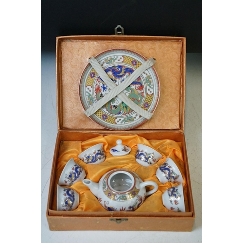 48 - Collection of oriental items to include porcelain vases, teapot / kettle, drinks set, etc