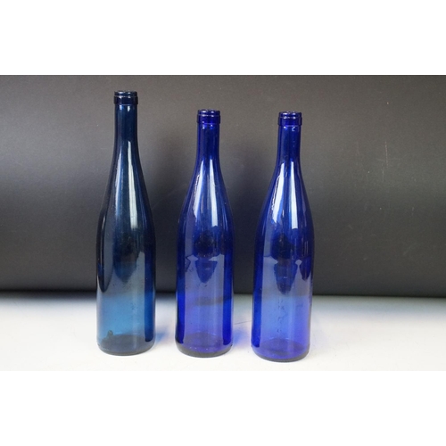 52 - Collection of nine vintage glass bottles to include blue poison bottles, J.B. Bowler of Bath Codd bo... 