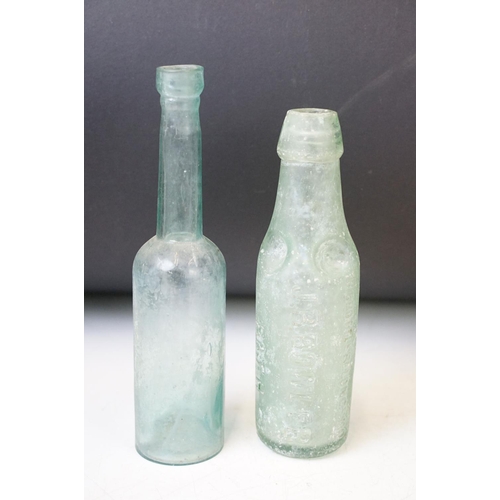 52 - Collection of nine vintage glass bottles to include blue poison bottles, J.B. Bowler of Bath Codd bo... 