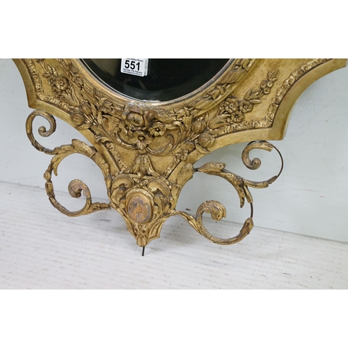 551 - Antique Giltwood and Gesso Framed Shaped Mirror in the Rococo style with oval bevelled plate, 95cm x... 