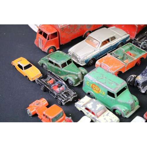 1254 - Around 50 play worn mid 20th C diecast models to include Dinky, Matchbox Lesney, Corgi etc