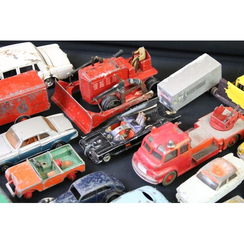 1254 - Around 50 play worn mid 20th C diecast models to include Dinky, Matchbox Lesney, Corgi etc