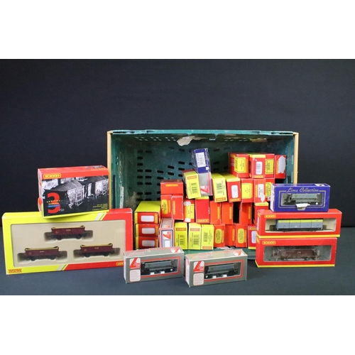 176 - 44 Boxed OO gauge items of rolling stock to include 38 x Hornby (features R6367 Coal Wagon Pack and ... 