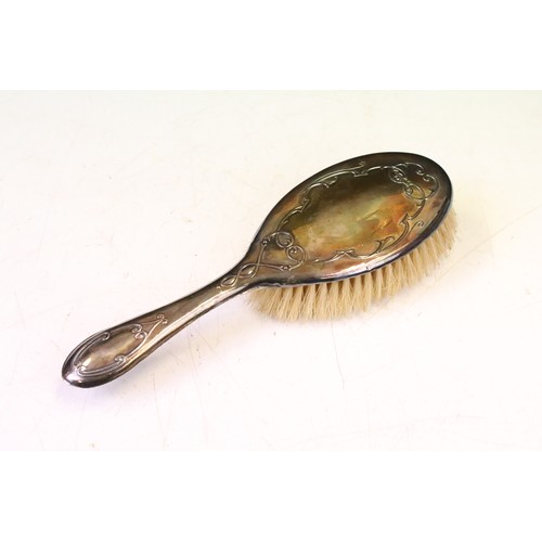 177A - Early 20th C silver hair brush with repousse scrolling decoration (approx 23.5cm long, Birmingham 19... 