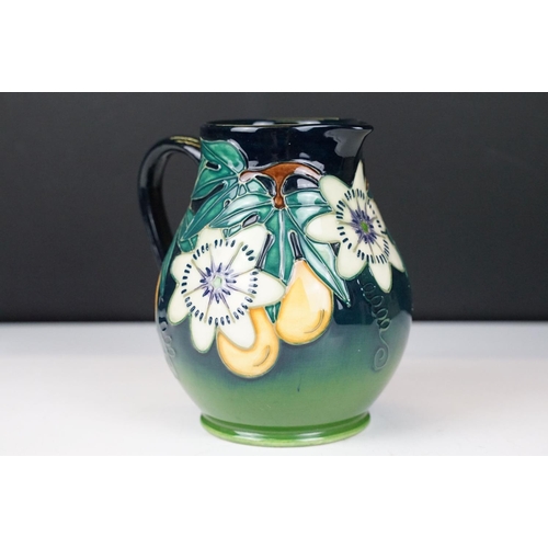 10 - Moorcroft Pottery 'Passion Fruit' pattern baluster jug, on a blue-green graduated ground, date mark ... 