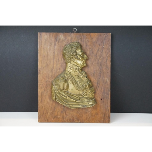 116 - 19th Century Duke of Wellington gilt metal profile, mounted on a rosewood panel. Measures approx 25.... 