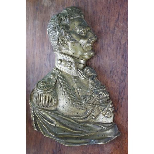 116 - 19th Century Duke of Wellington gilt metal profile, mounted on a rosewood panel. Measures approx 25.... 