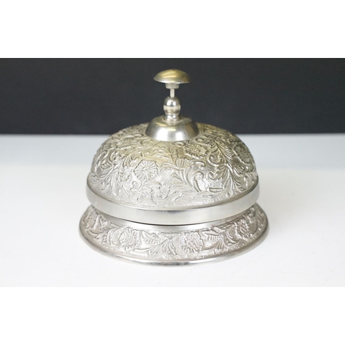 117 - Ornate metal shop/hotel reception bell, approx 14cm diameter