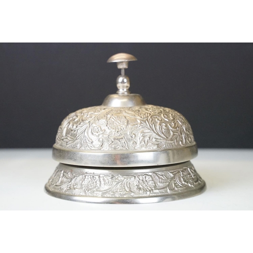 117 - Ornate metal shop/hotel reception bell, approx 14cm diameter