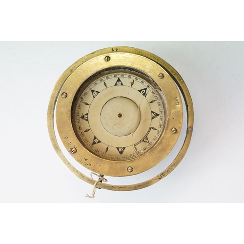 119 - J C Krohn & Son, Bergen, Norway - A brass nautical / ships compass on gimbal, approx 16.5cm overall ... 