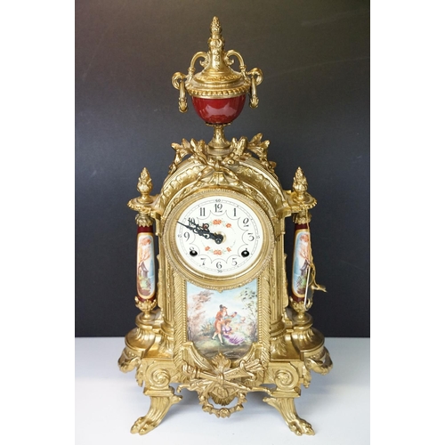 121 - Late 20th Century Franz Hermle Lancini brass clock garniture with ceramic panelling, the clock dial ... 