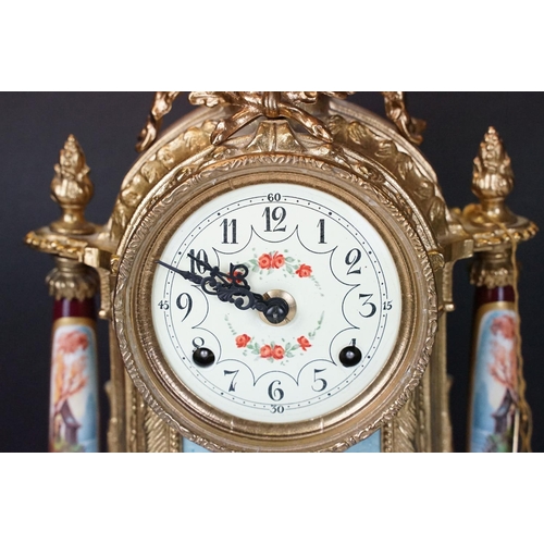 121 - Late 20th Century Franz Hermle Lancini brass clock garniture with ceramic panelling, the clock dial ... 