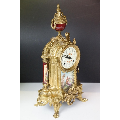 121 - Late 20th Century Franz Hermle Lancini brass clock garniture with ceramic panelling, the clock dial ... 