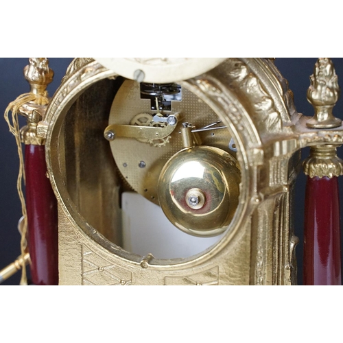 121 - Late 20th Century Franz Hermle Lancini brass clock garniture with ceramic panelling, the clock dial ... 