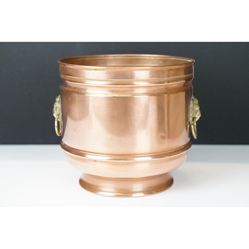 122 - Copper Circular Planter / Jardiniere with brass lion mask ring handles, 16cm high