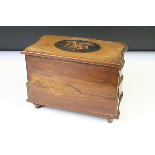 131 - 19th Century Victorian inlaid jewellery box having a serpentine front and hinged lid opening to reve... 