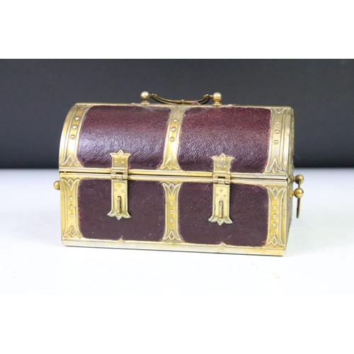 138 - 19th Century Victorian sewing box in the form of a dome top trunk with leatherette panels and emboss... 