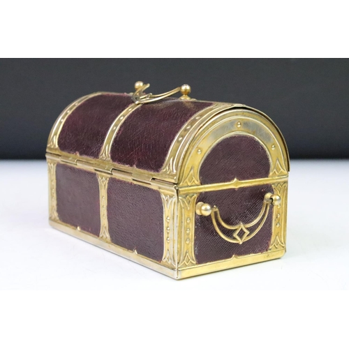 138 - 19th Century Victorian sewing box in the form of a dome top trunk with leatherette panels and emboss... 