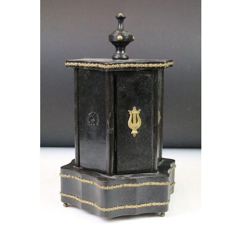 147 - 19th Century Victorian cigar dispenser constructed from ebonised wood of hexagonal form with six pan... 