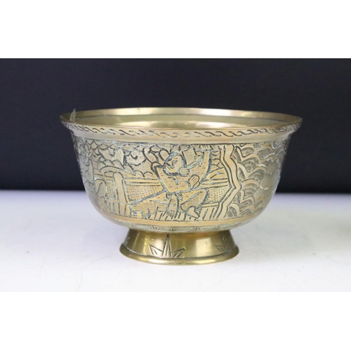 148 - Pair of Chinese brass footed bowls each with incised warrior decoration to the sides and with Xuande... 