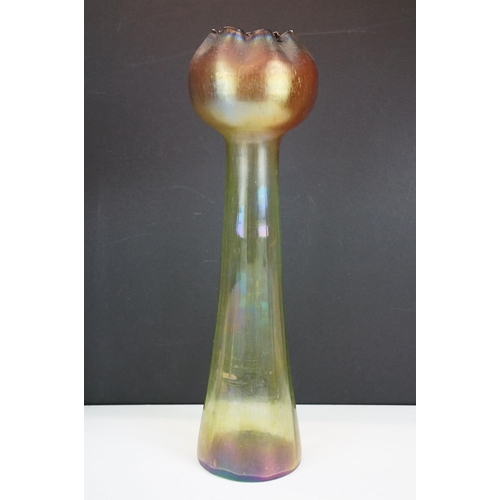 15 - Pair of Art Nouveau iridescent glass vases, in the manner of Loetz, with crimped bulbous tops raised... 