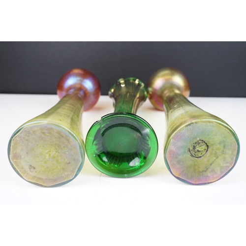 15 - Pair of Art Nouveau iridescent glass vases, in the manner of Loetz, with crimped bulbous tops raised... 