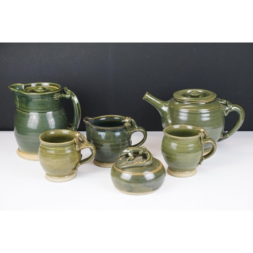 16 - Deverill Pottery green glazed tea set for two, with handles modelled as lizards, to include teapot, ... 