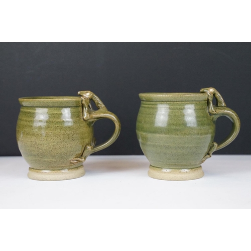 16 - Deverill Pottery green glazed tea set for two, with handles modelled as lizards, to include teapot, ... 