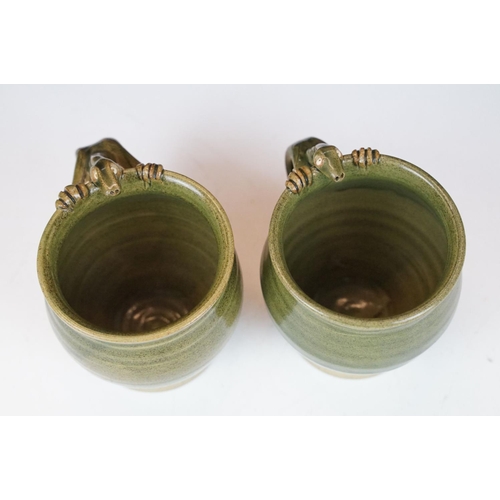 16 - Deverill Pottery green glazed tea set for two, with handles modelled as lizards, to include teapot, ... 