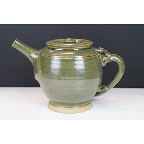 16 - Deverill Pottery green glazed tea set for two, with handles modelled as lizards, to include teapot, ... 