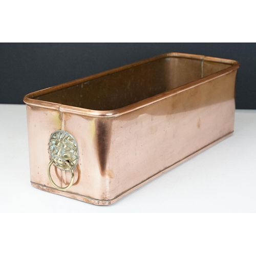 162 - Copper Rectangular Planter with rolled rim and brass lion mask ring handles, 40cm long